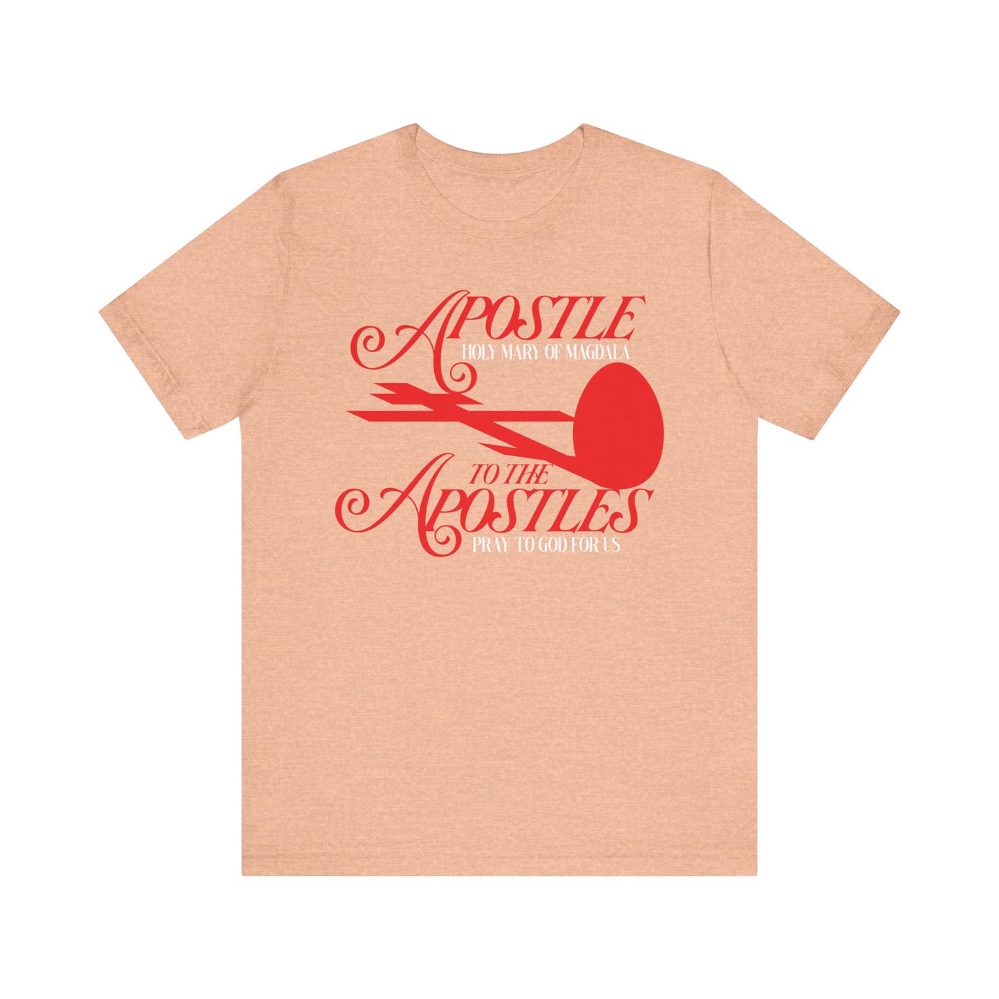 Heather Peach unisex cotton tee featuring red cross, red egg, and “Apostle to the Apostles | St. Mary Magdalene”—Orthodox Christian design honoring Saint Mary Magdalene.