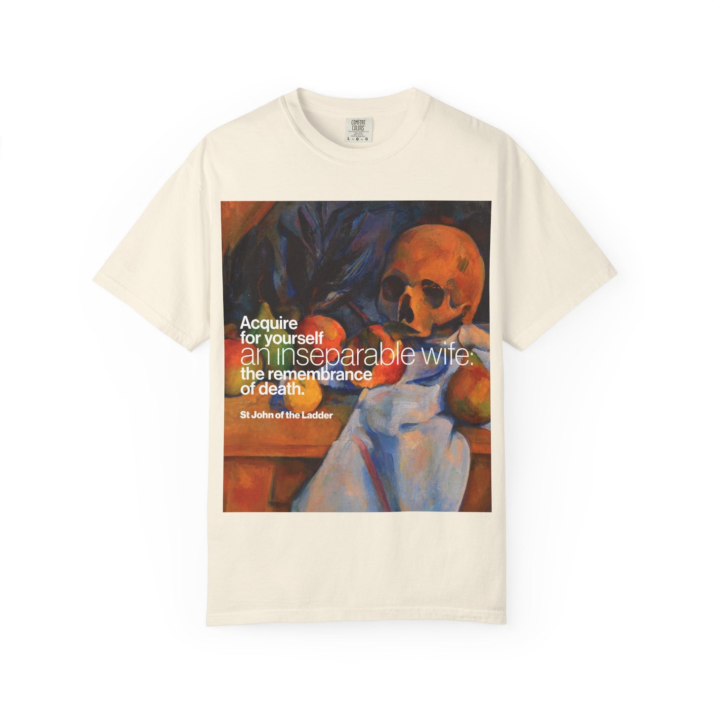 Ivory t-shirt titled “Acquire an Inseparable Wife (St John Climacus)” featuring Cezanne’s still life with a skull and St John Climacus’s powerful message: Acquire for yourself an inseparable wife—the remembrance of death. This Orthodox Christian heavyweight cotton unisex tee combines striking art with spiritual reflection.