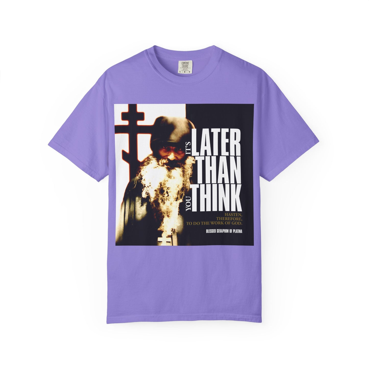Violet heavyweight cotton unisex t-shirt featuring a photo of Fr Seraphim Rose with modern cinematic poster typography: "It's Later Than You Think," inspiring reflection on life and God.