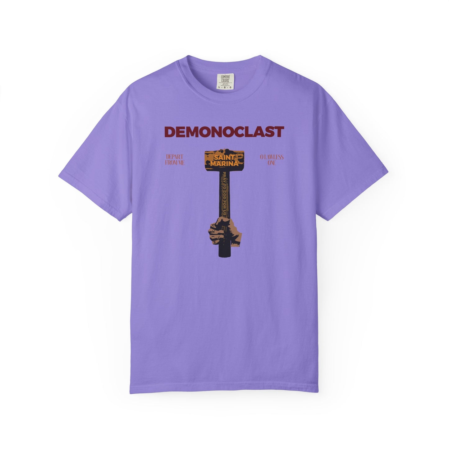 Violet heavyweight cotton unisex tee featuring ‘DEMONOCLAST’ text and a NIKA fist graphic, inspired by St. Marina’s Hammer and Orthodox themes of Christ Conquers, Unseen Warfare, and Martyrdom.