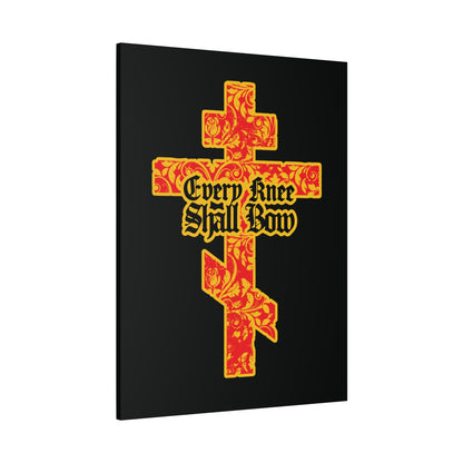 A gold and red floral textured Orthodox cross with Gothic lettering reading "Every Knee Shall Bow" and "Jesus Christ is Lord" on black, inspired by Isaiah 45:22-24 and Phil 2:7-11. Christian wall art.