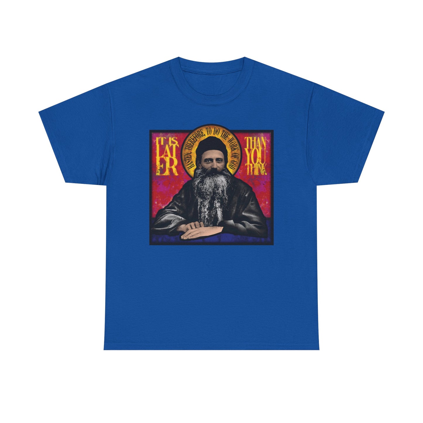 Royal blue "It Is Later Than You Think" midweight cotton unisex T-shirt featuring a stained glass-style image of Fr. Seraphim Rose—a modern American Orthodox monastic saint—with the thought-provoking message: “It’s later than you think,” serving as a striking reminder that the Kingdom of Heaven may be nearer than expected.