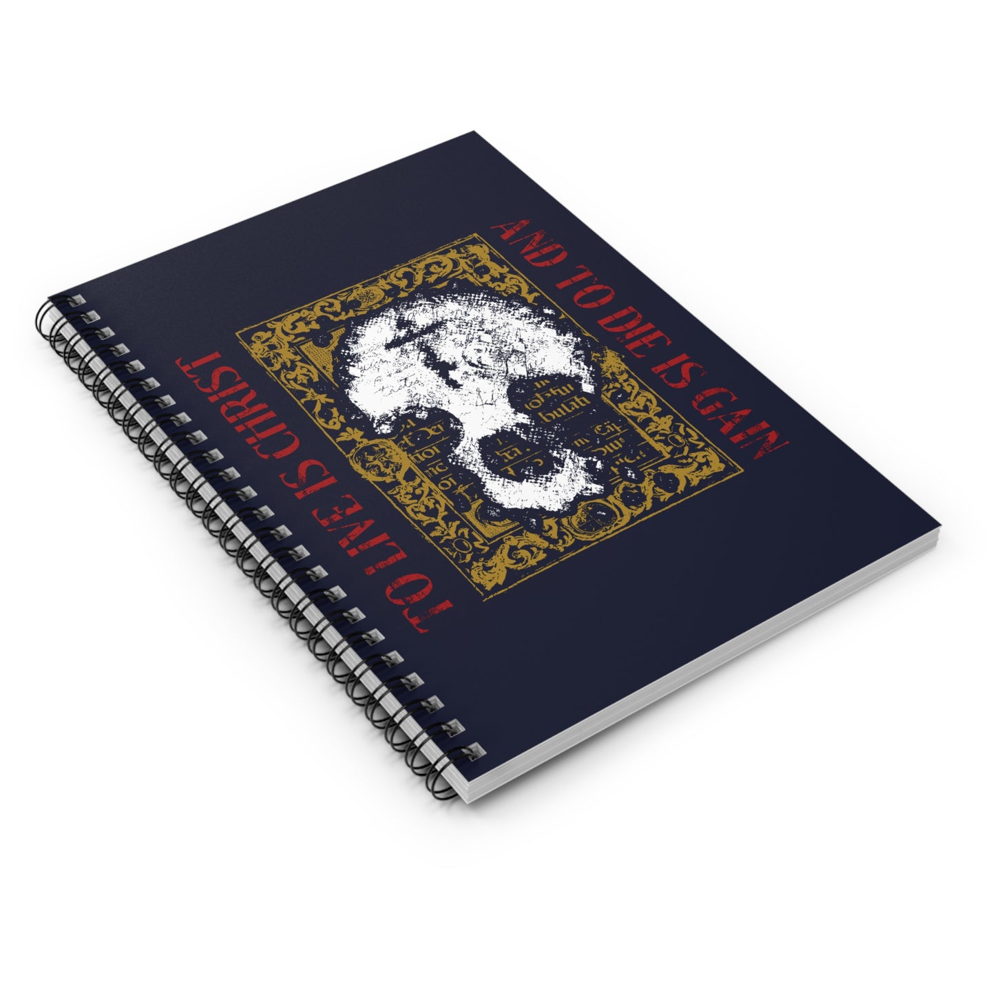 Navy spiral notebook: "To Live is Christ, to Die is Gain" (Philippians 1:21) with white skull and cross on gold manuscript texture—a daily Orthodox reminder of living out faith in Christ.