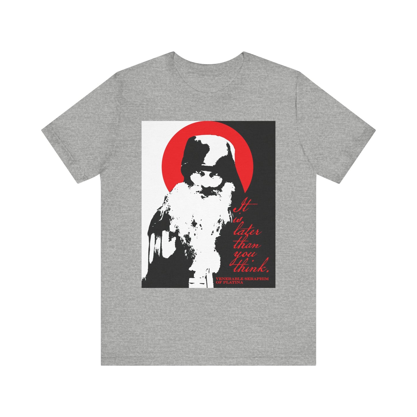 Athletic Heather t-shirt featuring a high-contrast black, white, and red design of Fr Seraphim Rose within a red circle, accompanied by the memento mori phrase "It's Later Than You Think"—a subtle nod to Orthodox spiritual life and the importance of spiritual discipline.