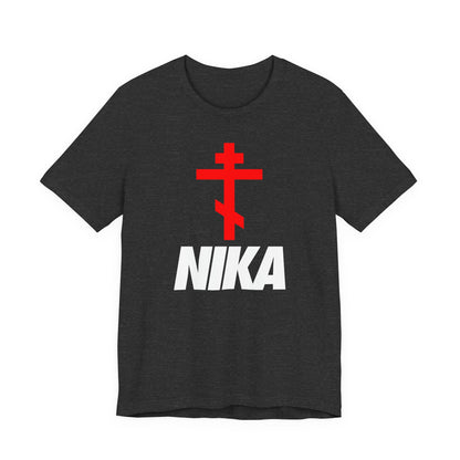Dark Grey Heather t-shirt with a red Orthodox cross above bold white NIKA text, blending athletic style and Christian symbolism—minimalist design inspired by Jesus Christ conquers.