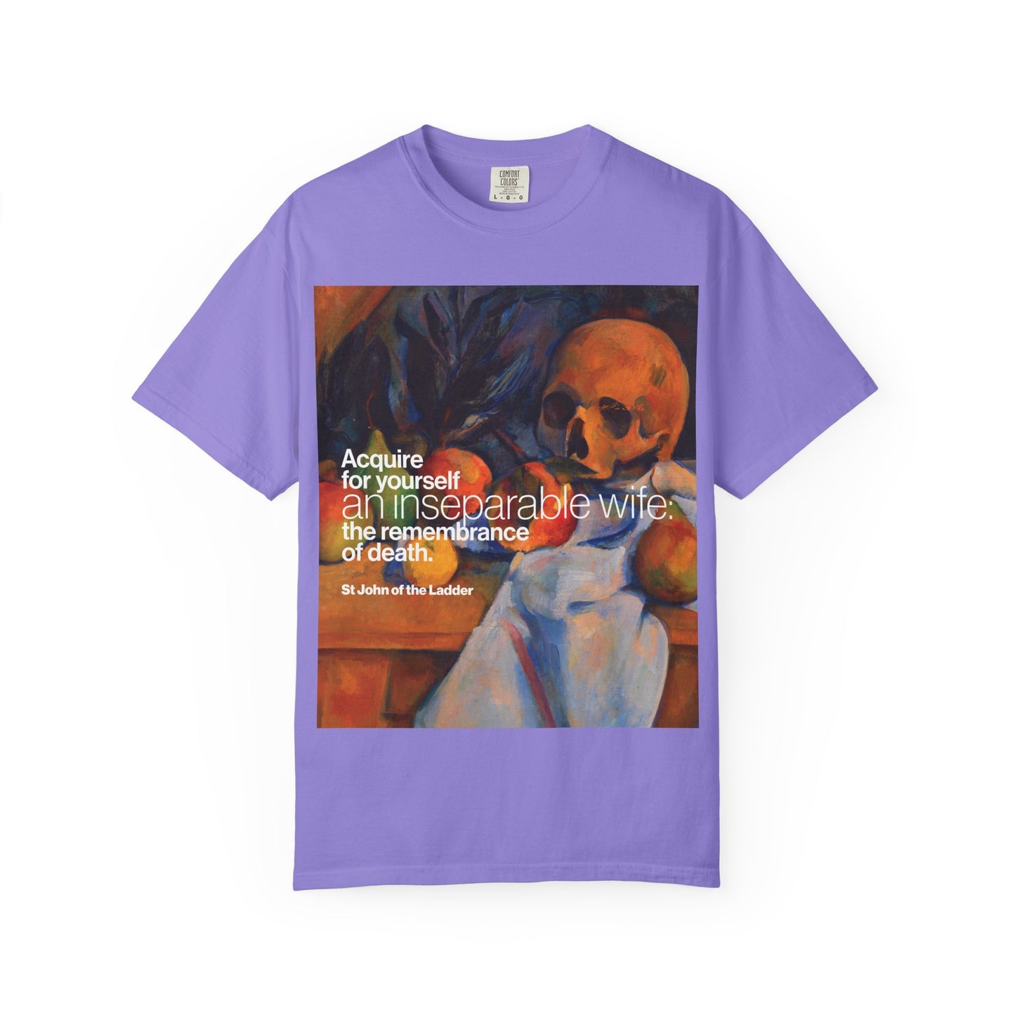 Violet heavyweight cotton unisex t-shirt titled “Acquire an Inseparable Wife (St John Climacus),” showcasing Cezanne’s Still Life with Skull and an evocative quote from St John Climacus on the remembrance of death, inspired by his profound spiritual teachings.