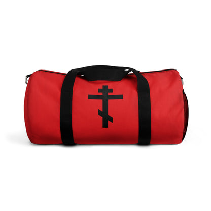 Carry your essentials in this Orthodox Christian Gym Duffel Bag featuring a black Orthodox cross on red and the Galatians 6:14 verse: "May I never boast, except in the cross of our Lord Jesus Christ.