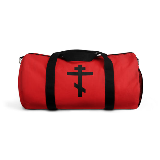 Carry your essentials in this Orthodox Christian Gym Duffel Bag featuring a black Orthodox cross on red and the Galatians 6:14 verse: "May I never boast, except in the cross of our Lord Jesus Christ.