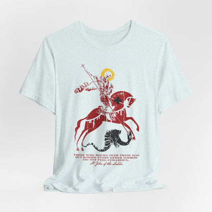 Lightweight cotton unisex tee titled “Those Who Mourn Over Their Sins,” featuring an iconographic illustration of St. George slaying the dragon, with a quote inspired by St. John Climacus beneath the artwork, reflecting Orthodox Christian themes of godly mourning and soulful sadness.