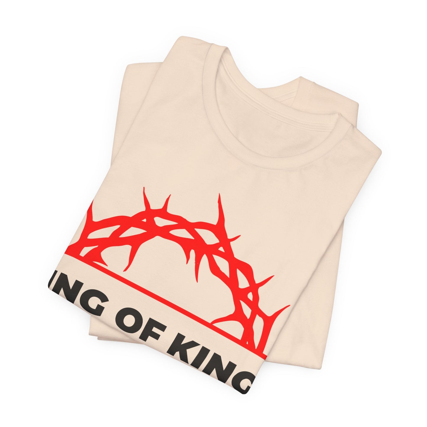 The King of Kings Crown of Thorns unisex tee features a red crown of thorns graphic and partial text KING OF KING, inspired by Revelation 19:16 where Christ is King—Orthodox Christian cotton shirt.