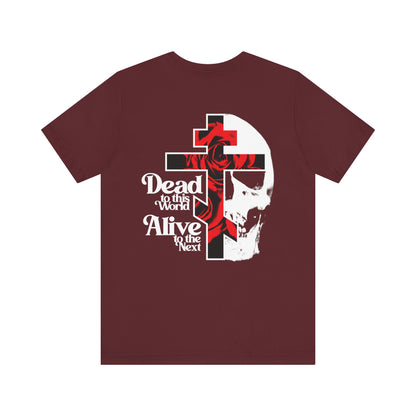 Maroon “Dead to this World” Christian Goth tee, featuring a flower cross & skull graphic with text. BACK PRINT 2-sided w/ branded front. Lightweight cotton unisex fit—symbolizes renunciation and the Ladder of Divine Ascent.