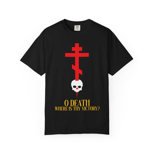 Black heavyweight cotton unisex t-shirt featuring a red Orthodox cross stabbing a white skull with yellow text: “O Death Where is Thy Victory?” (1 Corinthians 15:55). Inspired by the Resurrection; Jesus Christ is King.