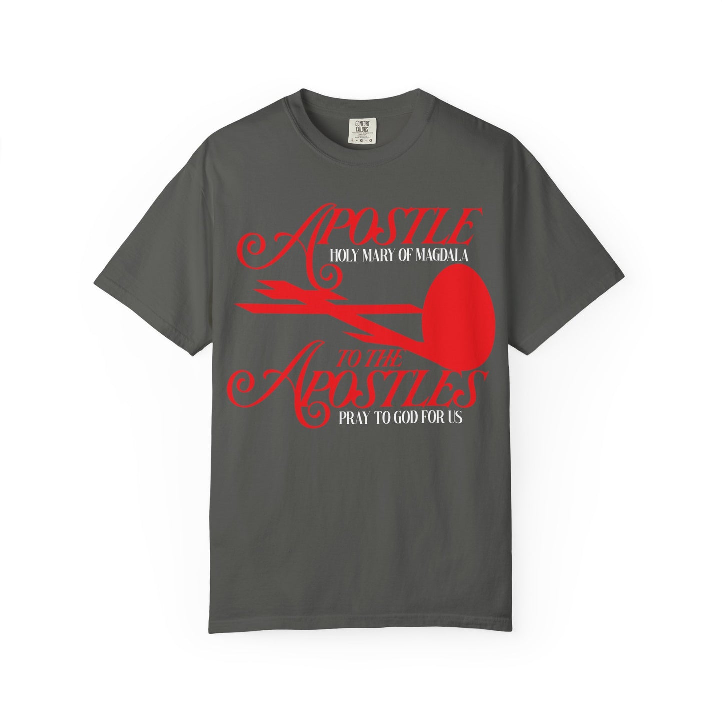 Pepper-colored heavyweight cotton unisex tee featuring a red cross and red egg graphic with the text “Apostle to the Apostles, Pray to God for Us,” inspired by Saint Mary Magdalene at the Tomb of Jesus.
