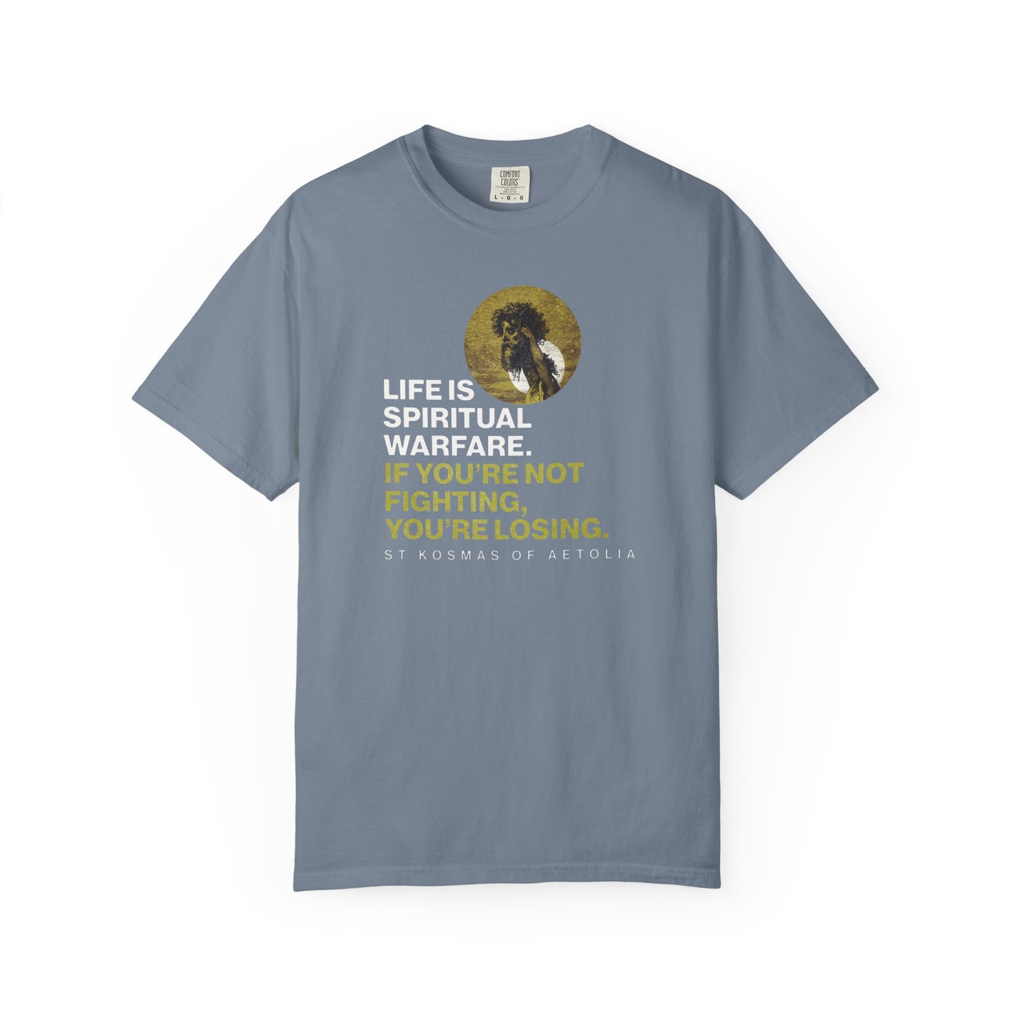 Show your faith and strength in this Blue Jean heavyweight cotton tee: “Life is Spiritual Warfare”—inspired by St. Kosmas of Aetolia, with bold text and an Orthodox design featuring David & Goliath. Unisex fit; perfect for spiritual expression.