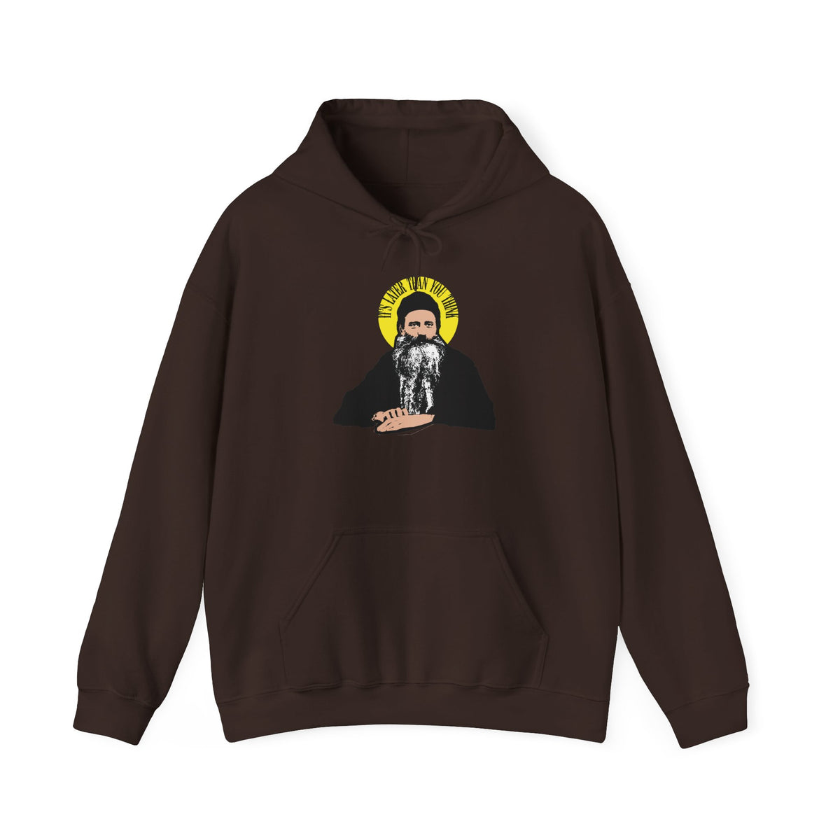 Dark chocolate hoodie featuring a bold graphic of Fr Seraphim Rose, depicted with a yellow halo and bearded visage, accompanied by the quote “It’s Later Than You Think” above the image. This modern American Orthodox Christian design draws on themes of mortality and traditional iconographic elements.