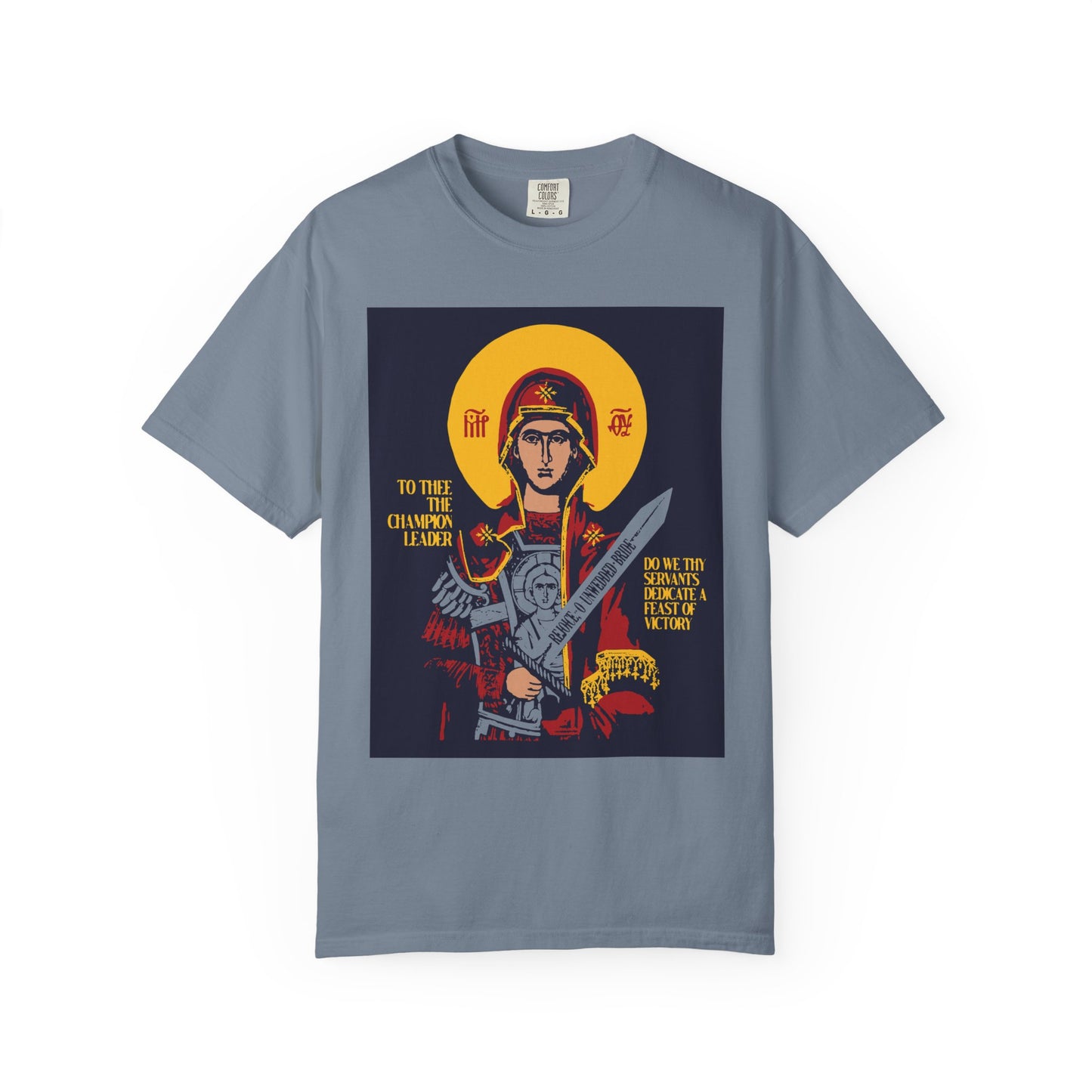Blue Jean "To Thee the Champion Leader" Orthodox t-shirt features the Theotokos with sword, golden halo, religious text, and angels for a celestial look. Heavyweight cotton unisex fit.