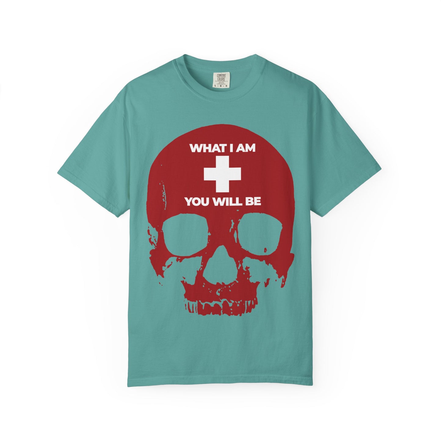 Seafoam tee featuring a striking red skull and white cross, with the message "WHAT I AM YOU WILL BE" above and below the cross—echoing the timeless wisdom of Ecclesiastes in this Orthodox Christian heavyweight cotton unisex shirt.