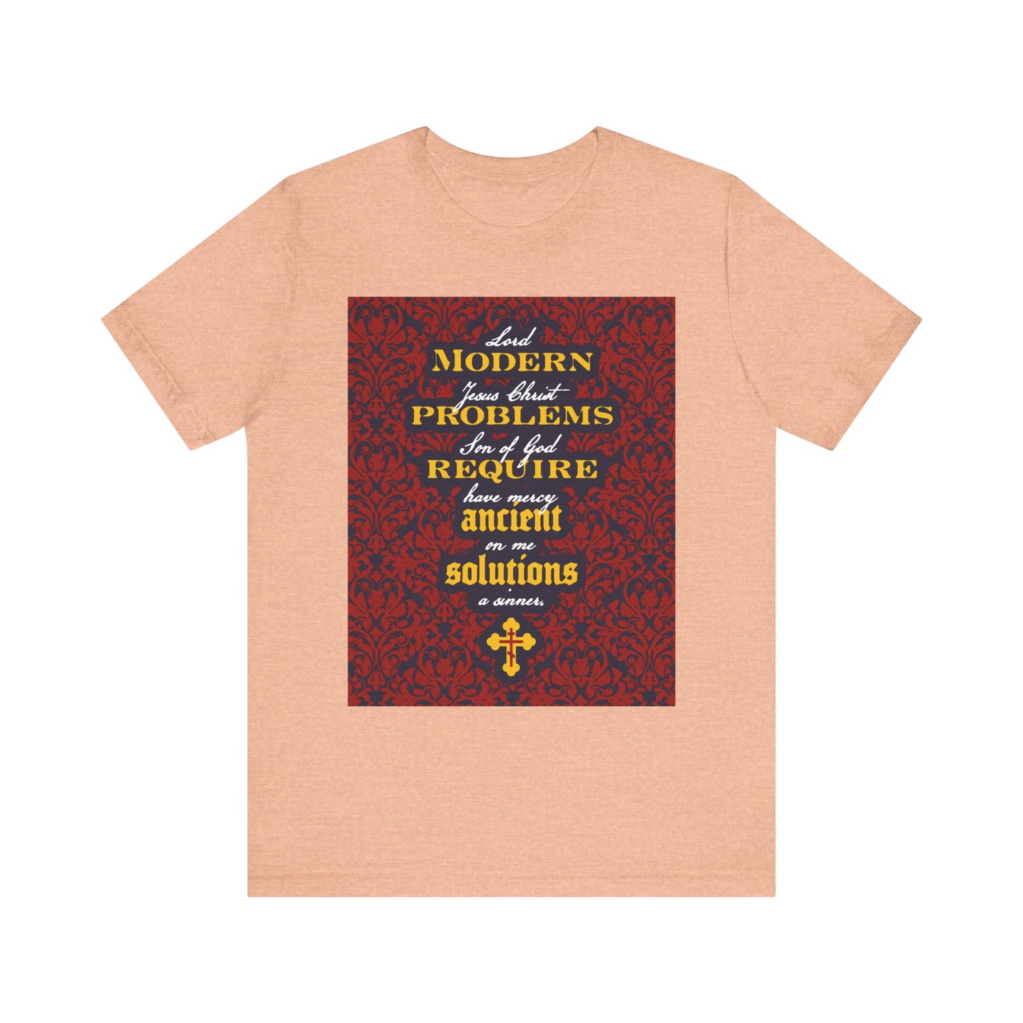 Heather Peach unisex lightweight cotton T-shirt featuring an ornate floral design and the phrase “Modern Problems Require Ancient Solutions” on the front, subtly referencing prayer and timeless wisdom through the divine name of Jesus Christ.