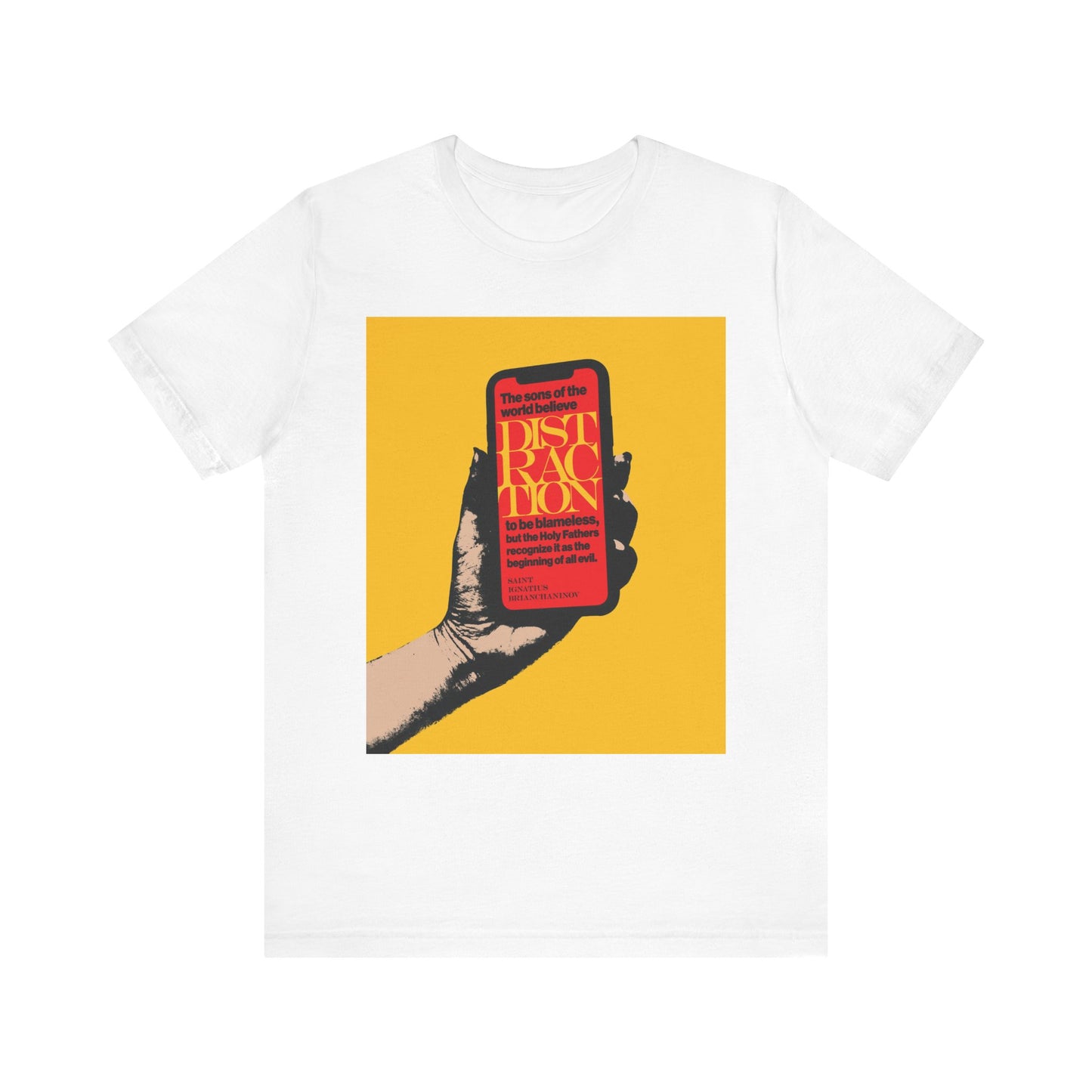 White cotton unisex tee, "Distraction is the Beginning of All Evil" (St Ignatius Brianchaninov), features a graphic of a hand gripping a phone on yellow with bold red “DISTRACTION”—highlighting mobile phone addiction. Orthodox Christian design.