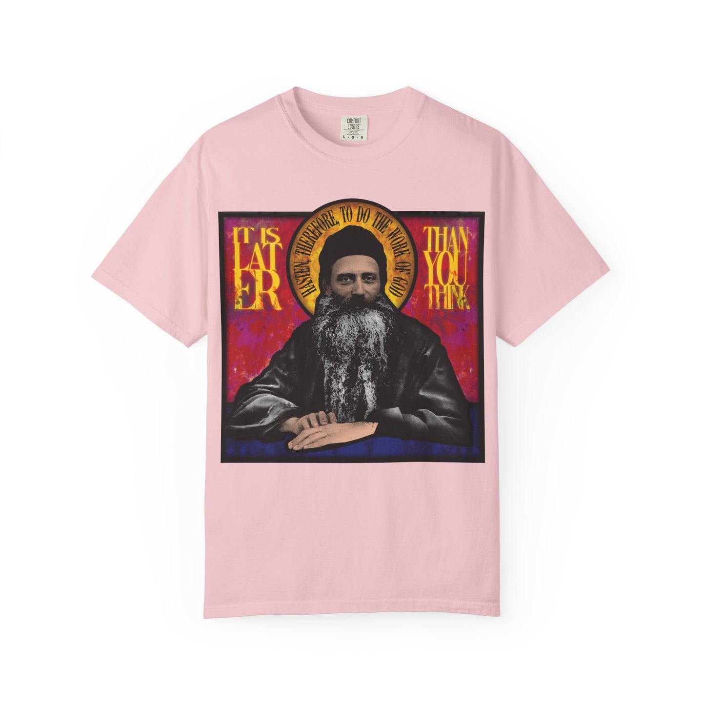 Heavyweight cotton unisex T-shirt featuring a stained glass portrait of Fr. Seraphim Rose and the phrase "It is later than you think"—a tribute to the American Orthodox monastic saint.