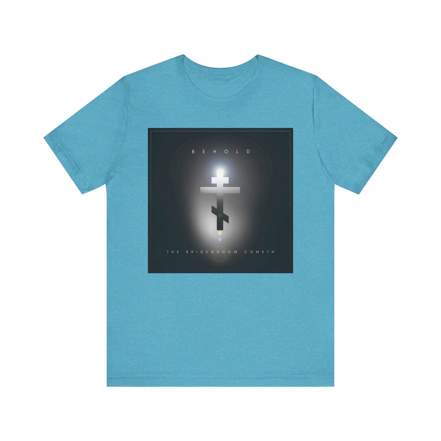 Heather Aqua unisex T-shirt featuring a minimalist cinematic lens flare Orthodox cross and “BEHOLD THE BRIDEGROOM COMETH” text, inspired by Orthodox Christian themes. Lightweight cotton design for comfort.