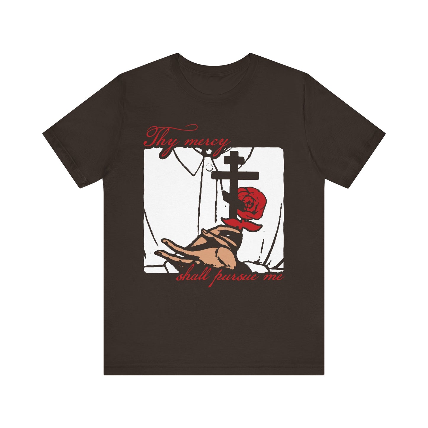 Brown t-shirt featuring an Orthodox Martyr's Cross, hand, and red rose in an icono-graphic style. Red text reads: "Thy mercy shall pursue me." Inspired by Psalm 22 (23) and the path of righteousness, this lightweight cotton unisex design is a reminder that the Lord is my shepherd.