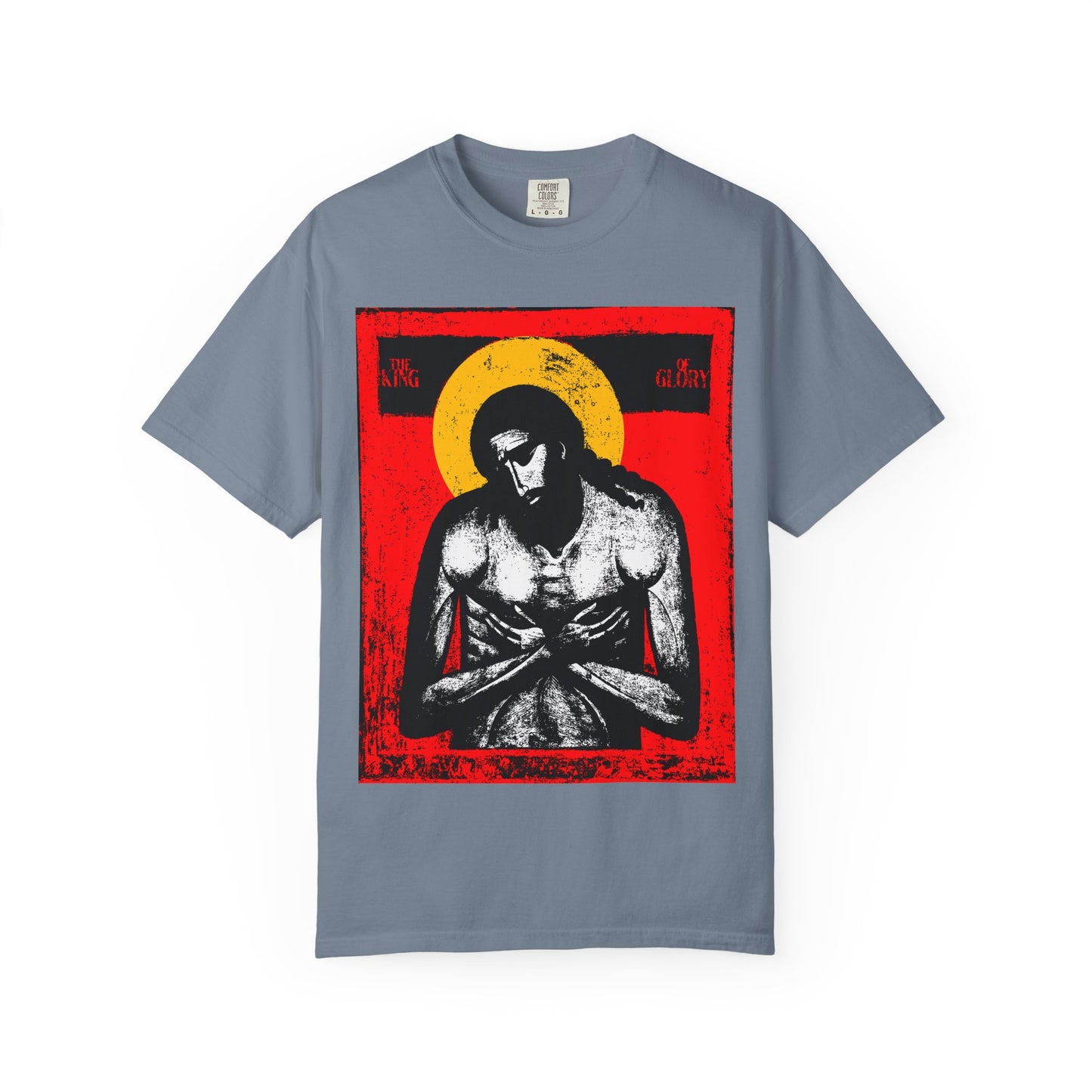 Blue Jean heavyweight cotton tee displaying The King of Glory Jesus Christ "Extreme Humility" IconoGraphic in red, yellow, white, and black—an artistic Christian devotional inspired by Isaiah 53's message of sacrifice.