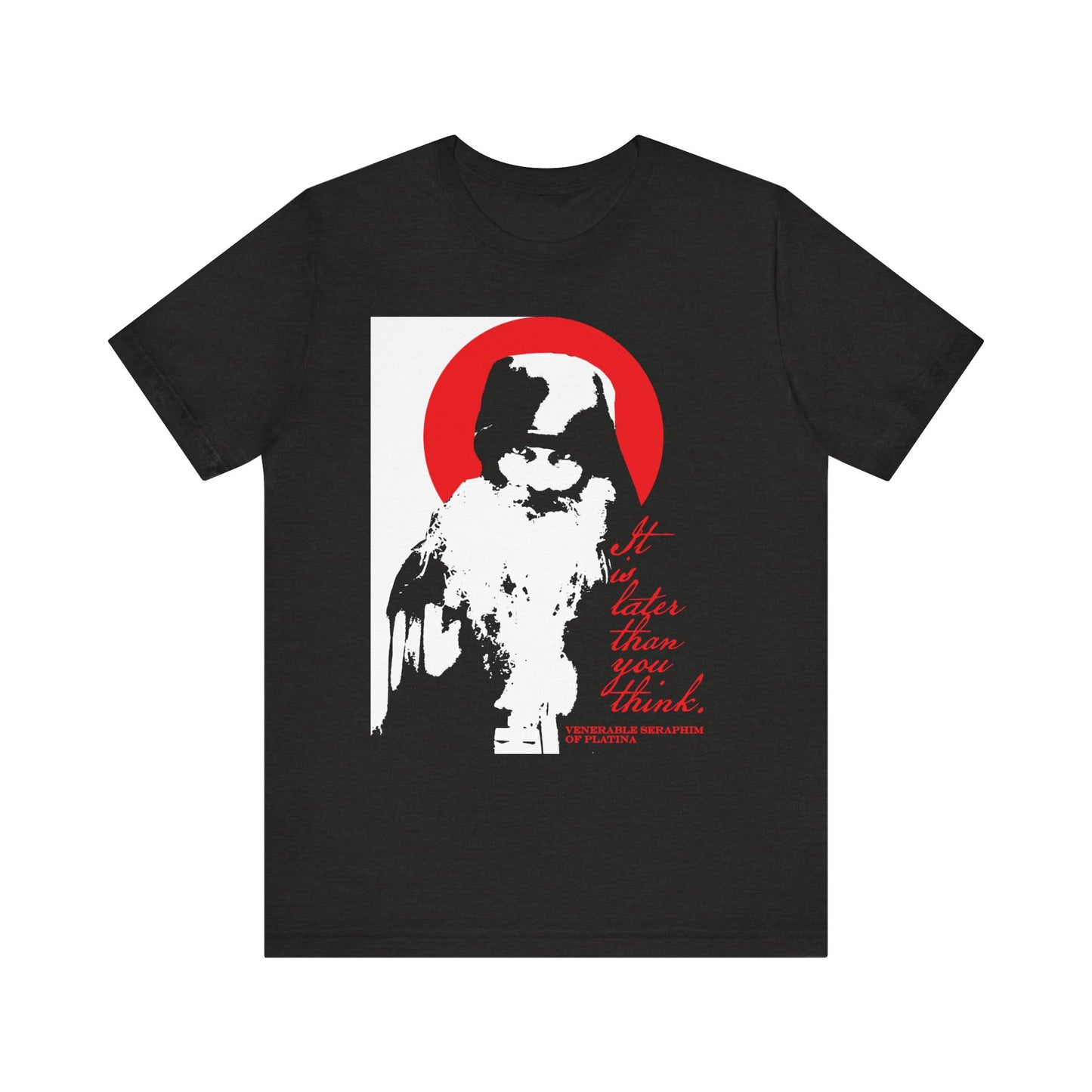 Black Heather t-shirt titled "It's Later Than You Think," featuring a high-contrast image of Fr. Seraphim Rose with a red circle and the Memento Mori text—a striking nod to Orthodox spiritual literature and the call to spiritual discipline, crafted from lightweight cotton for all genders.