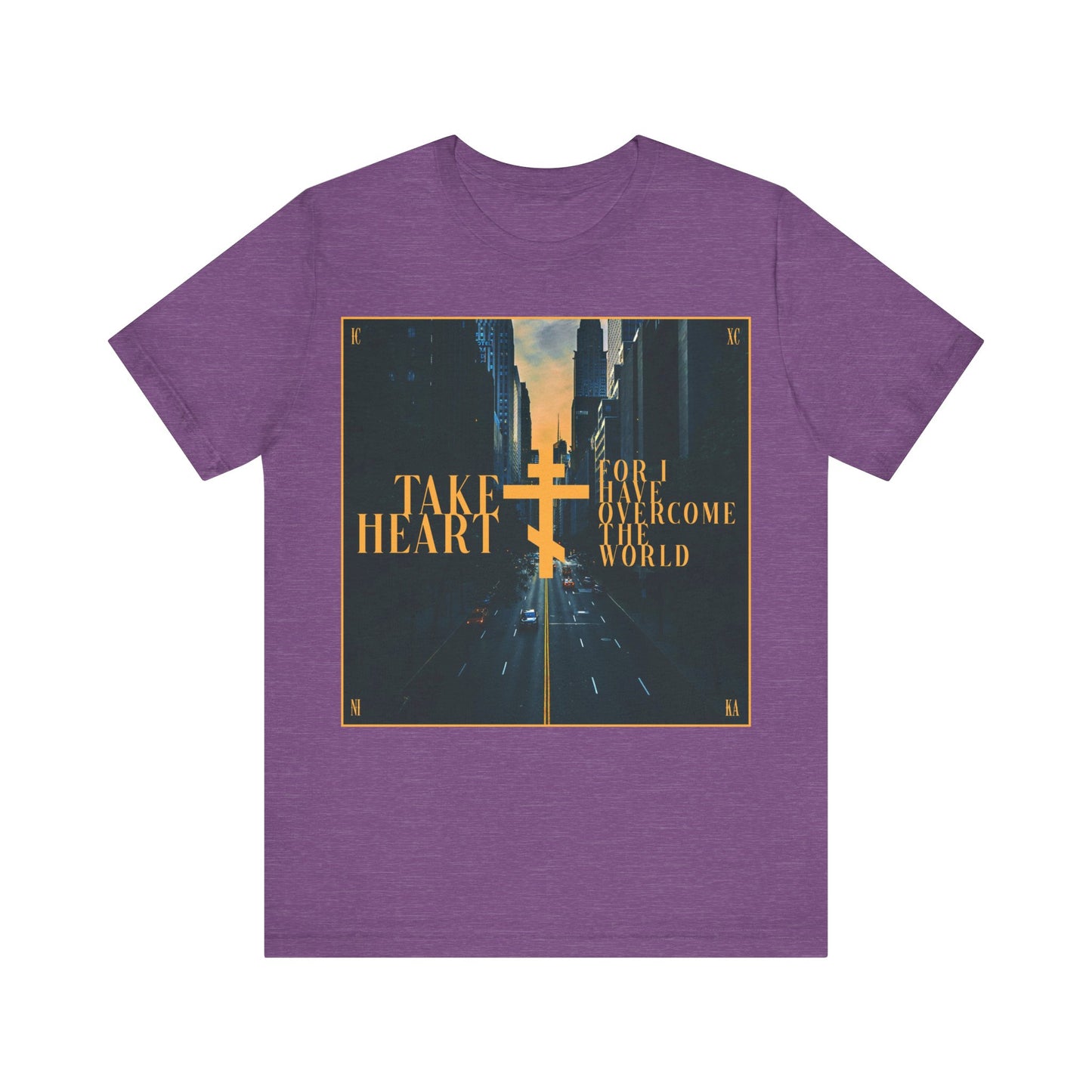 Wear hope with our Heather Team Purple "Take Heart, For I Have Overcome the World" Orthodox Christian T-shirt. Featuring a modern city street scene, this cotton tee inspires joy and faith with John 16:33's powerful message.