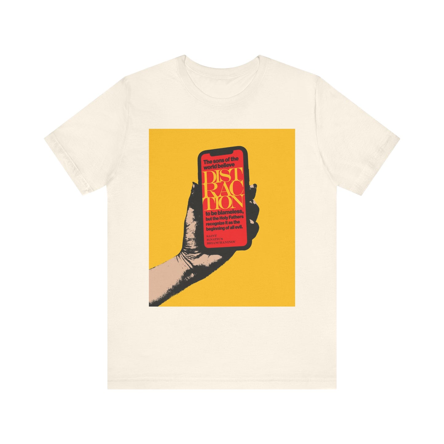 Natural cotton tee featuring “Distraction is the Beginning of All Evil” (St Ignatius Brianchaninov), with a graphic of a hand holding a phone and bold red/yellow text on mobile phone addiction. Orthodox Christian unisex design.