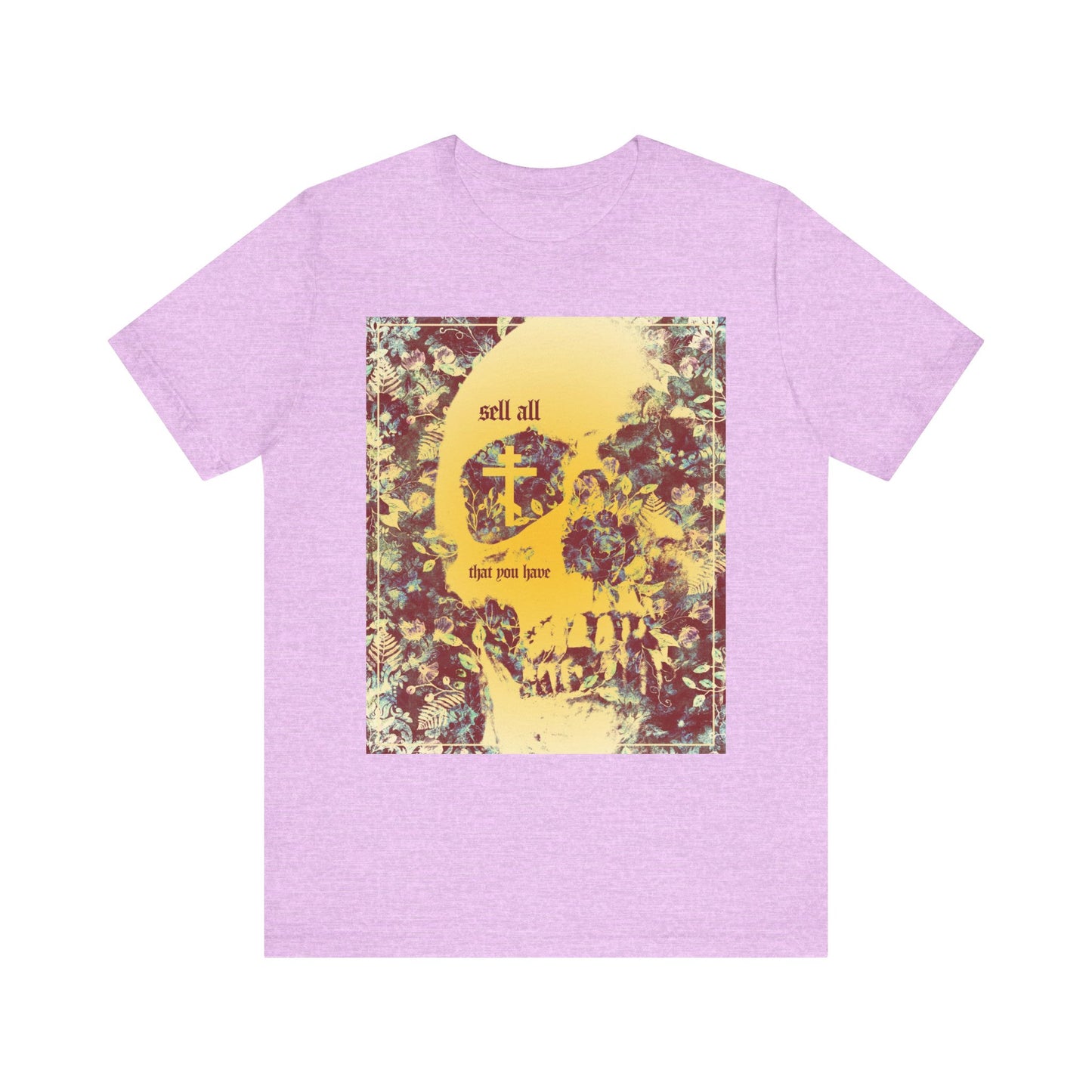 Heather Prism Lilac tee featuring an Orthodox cross, skull, and floral texture design with the text “Sell All That You Have”—a bold statement inspired by the ascetic Christian call to seek the Kingdom of Heaven.