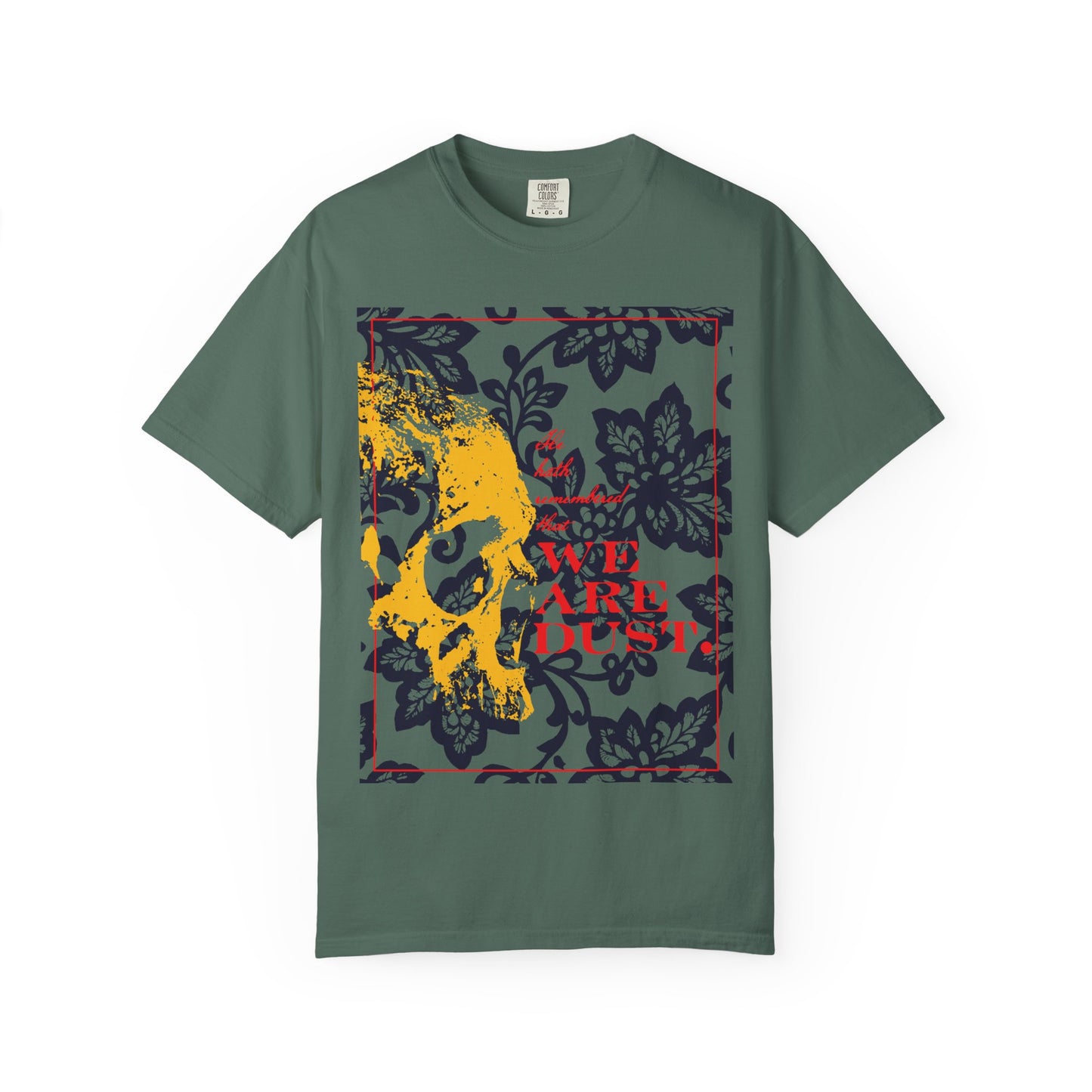Blue Spruce T-shirt featuring a yellow skull on a blue floral background and bold red text reading WE ARE DUST—a striking memento mori inspired by Psalm 102 and the compassion and mercy of the Lord.