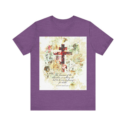 Heather Team Purple t-shirt featuring a white & beige floral scrapbook texture cross and inspirational St Irenaeus text, in an arts & crafts style, inspired by Orthodox Christian writings.