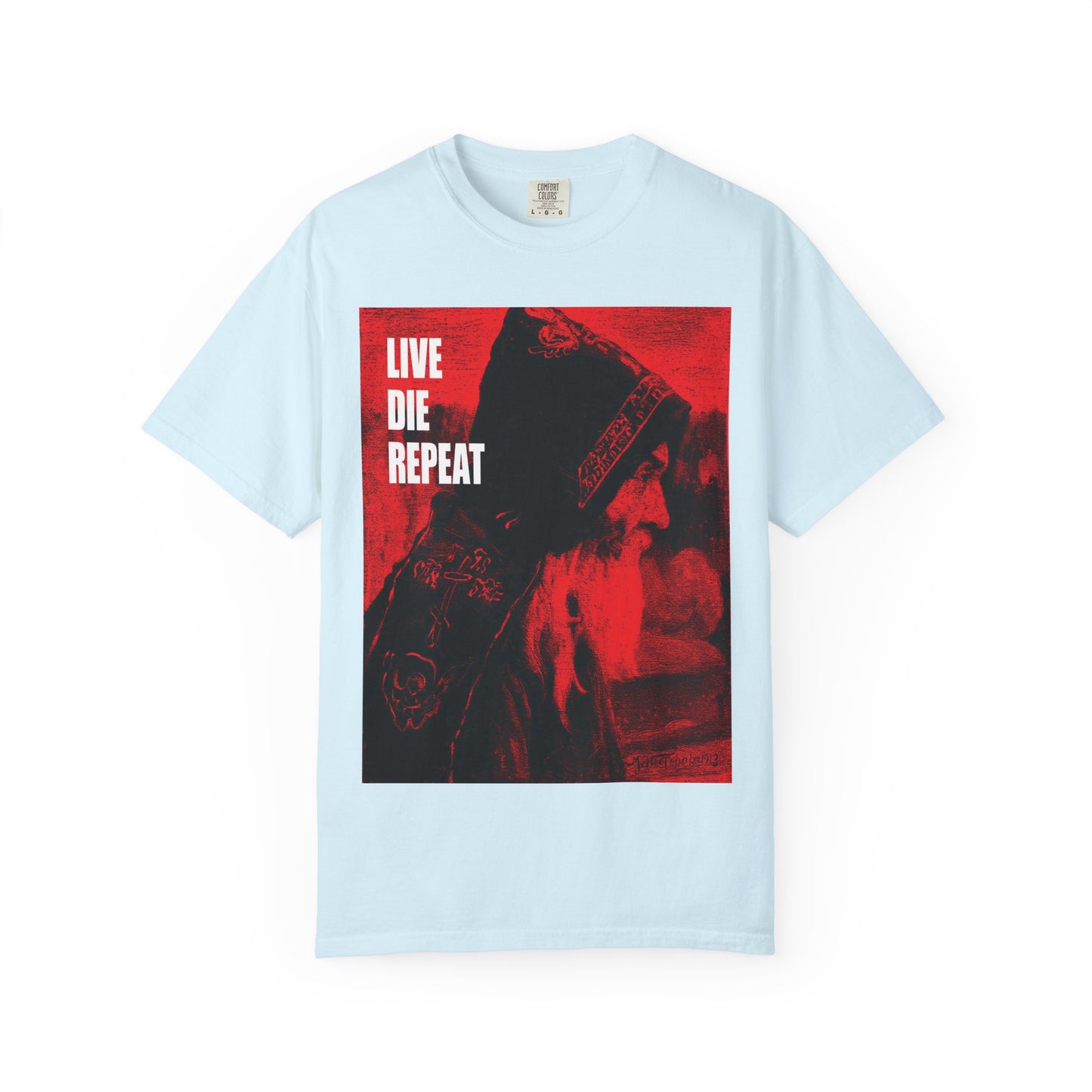 Chambray tee featuring Orthodox Monk art by Mikhail Nesterov and the phrase "Die Every Day, You Will Live Forever"—a powerful message to embrace every moment. Heavyweight cotton unisex fit.