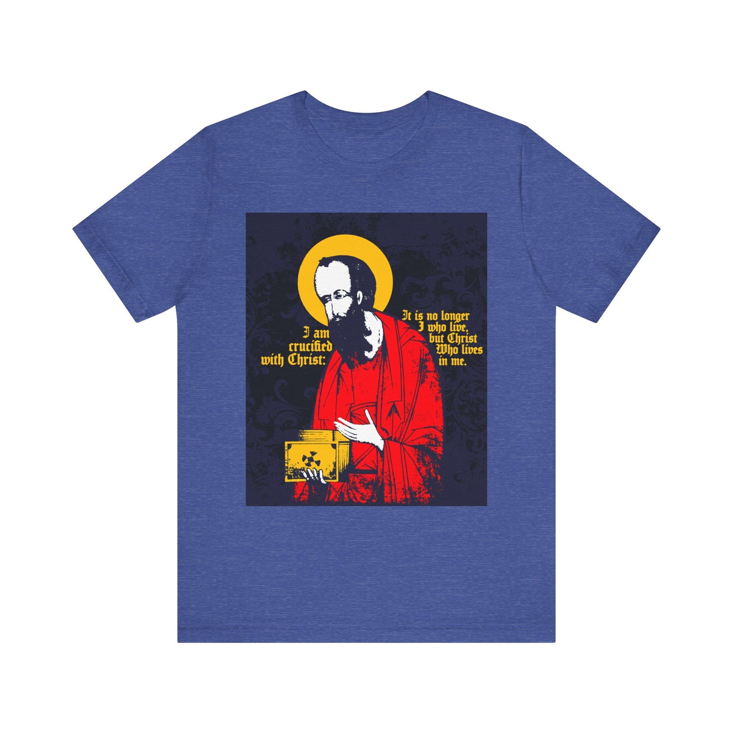 Heather True Royal t-shirt featuring an iconographic design of St Paul holding the Gospel and vibrant yellow text: “I am crucified with Christ (Galatians 2:20)”—a meaningful Orthodox Christian lightweight cotton unisex tee that reflects faith and new life in Christ.