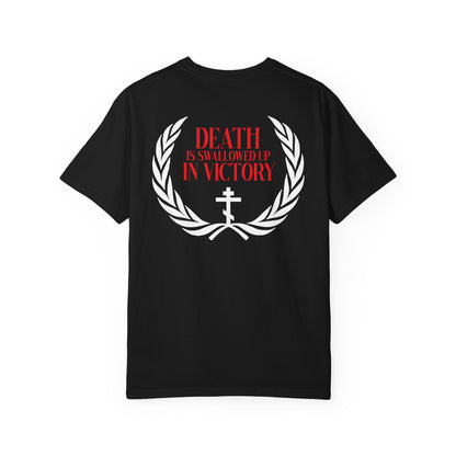 Archangel Michael of the Apocalypse Iconographic / Death is Swallowed Up In Victory DOUBLE-SIDED heavyweight cotton Orthodox unisex tee featuring a black base with a white laurel, cross, and red text—“Death is swallowed up in victory”—on the back, inspired by Revelation 12 and the Miracle of Archangel Michael.