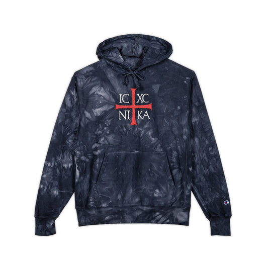 Navy tie-dye hoodie featuring an embroidered red cross with white "ICXC NIKA" text, inspired by Orthodox Christian faith and Romans 8:31-39. Premium streetwear: ICXC NIKA Means Jesus Christ Conquers.