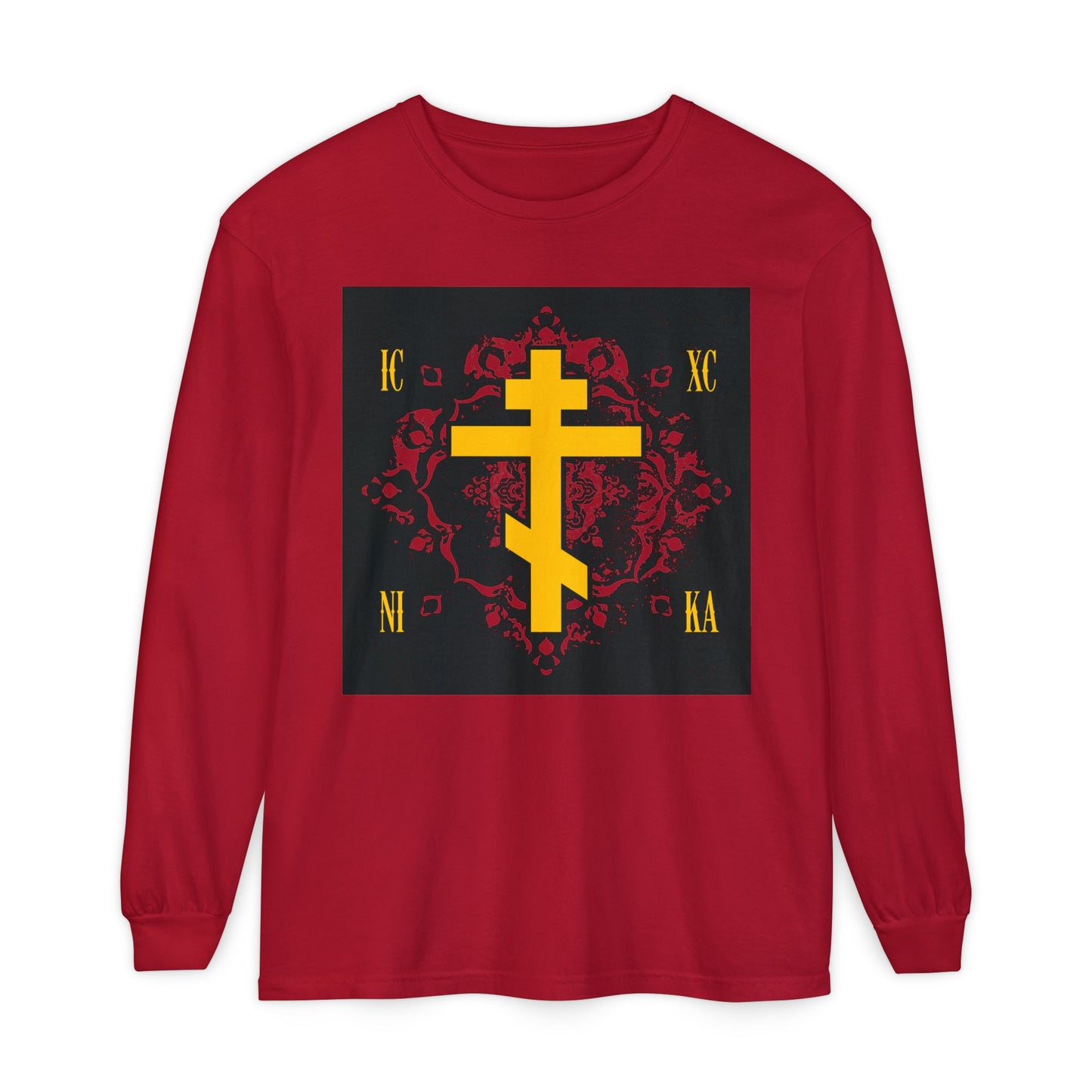 The ICXC NIKA Orthodox Christian red long sleeve shirt features a yellow Russian cross and Cyrillic letters on an ornate red background with a "Jesus Christ Conquers" design.