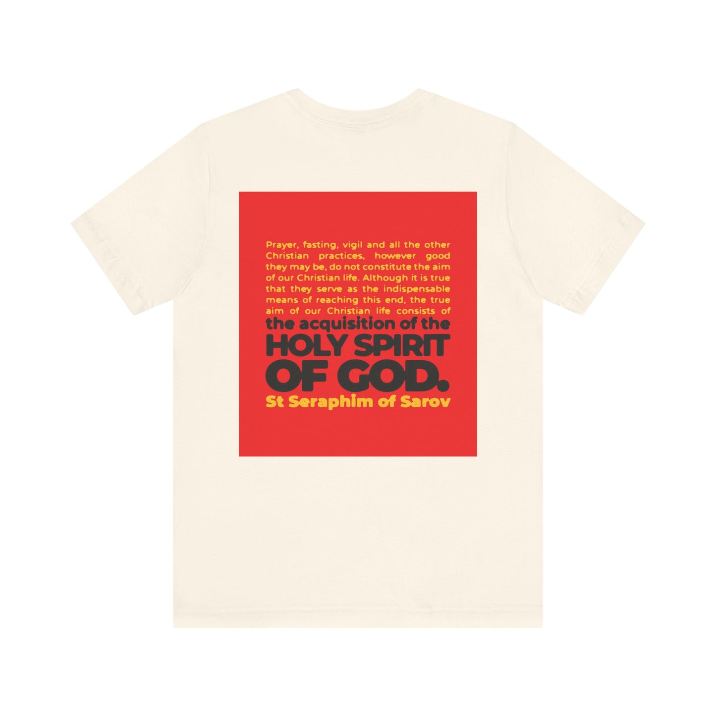 True Aim of Christian Life Tee: Cream cotton unisex shirt with a red square on the back featuring St. Seraphim of Sarov’s quote on acquiring the Holy Spirit. IconoGraphic Orthodox-inspired 2-sided lightweight design to inspire your faith.