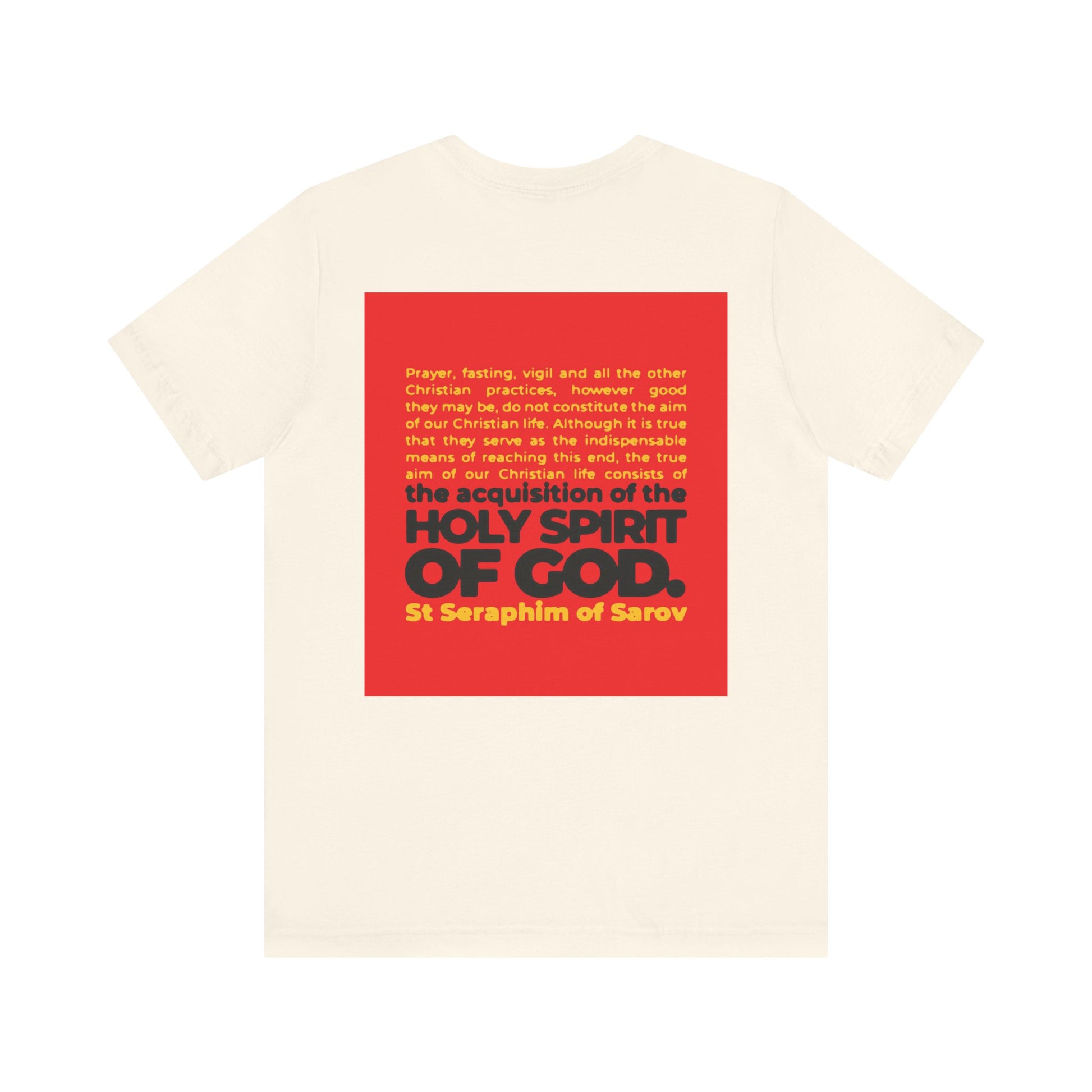True Aim of Christian Life Tee: Cream cotton unisex shirt with a red square on the back featuring St. Seraphim of Sarov’s quote on acquiring the Holy Spirit. IconoGraphic Orthodox-inspired 2-sided lightweight design to inspire your faith.