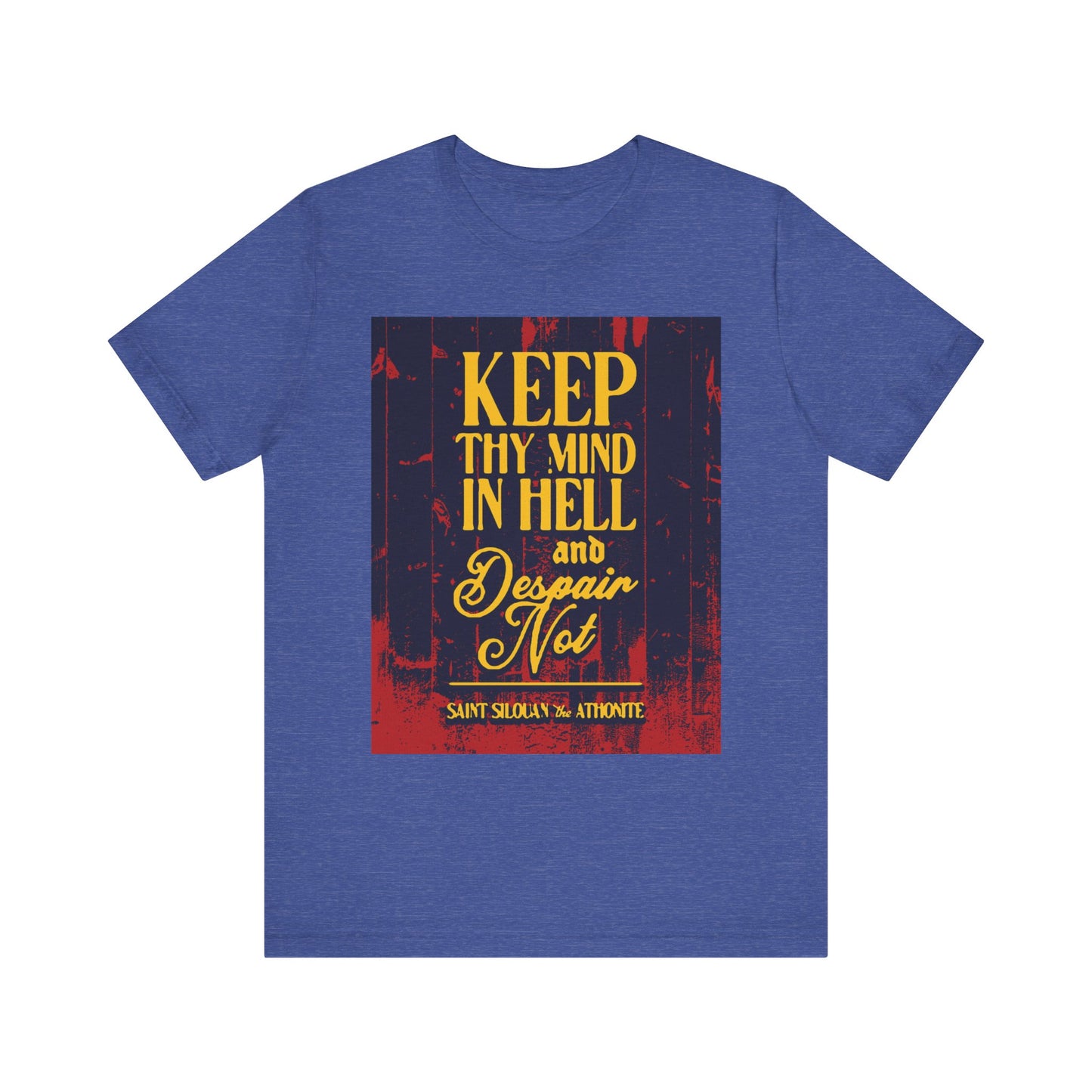 The "Keep Thy Mind in Hell and Despair Not" Orthodox Christian tee features St. Silouan’s message in gold and red on a Heather True Royal lightweight cotton unisex shirt.