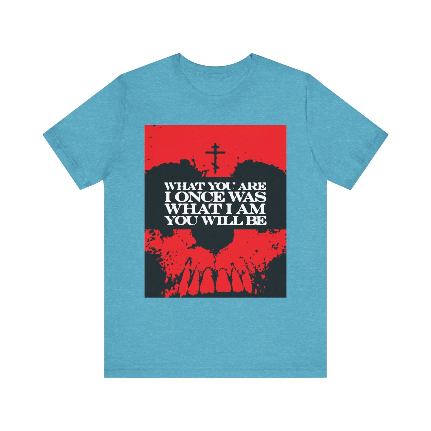 Heather aqua tee featuring a red and black skull graphic and white text that reads: WHAT YOU ARE I ONCE WAS WHAT I AM YOU WILL BE—a striking memento mori design that invites reflection on mortality and Christian hope for salvation.