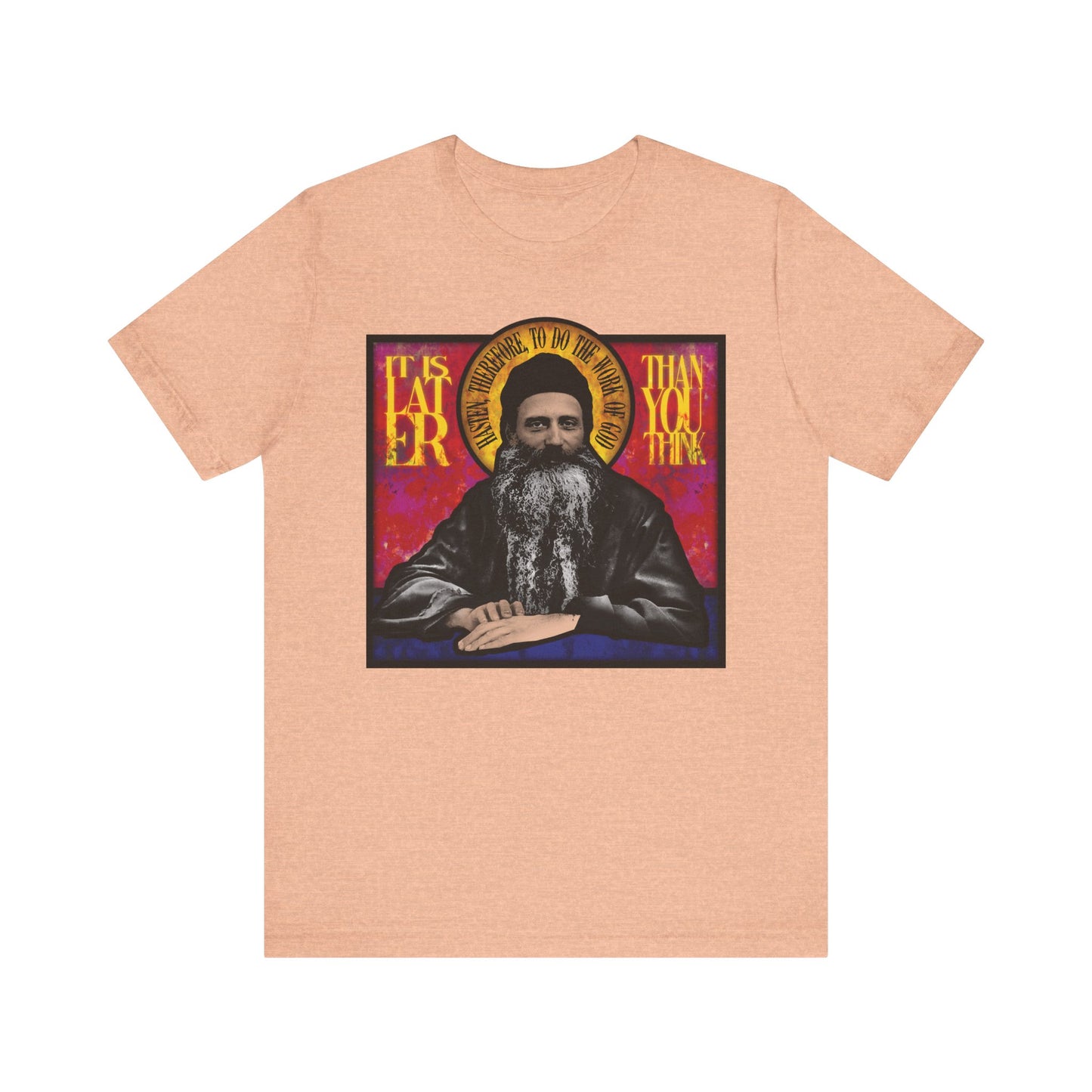 Heather peach unisex t-shirt with a stained glass design of Fr. Seraphim Rose and the text “It is later than you think”—a thoughtful nod to salvation and reflection. Lightweight cotton, inspired by an American Orthodox monastic saint.