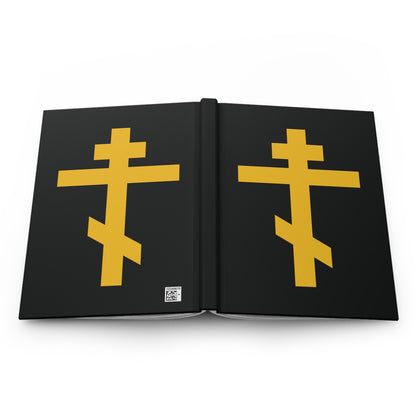 Yellow Orthodox Cross on black background hardcover journal, titled "Precious and Life-Giving Weapon of Unseen Warfare | Scourge of Demons," symbolizing Galatians 2:20 and being crucified with Christ.