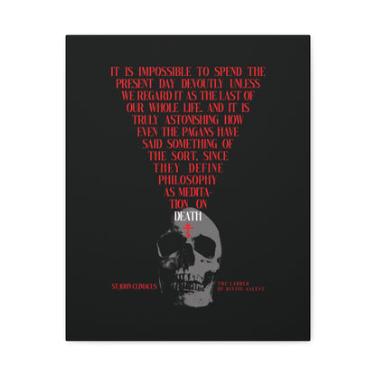 A skull with a red Orthodox cross and a St John Climacus quote on death and philosophy, set on black. "The Present Day As the Last Day of Our Life" Orthodox canvas wall art – Memento Mori.