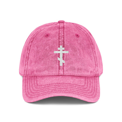 Minimalist pink cap featuring a simple white Orthodox TriBar Cross embroidery, symbolizing the Precious and Life-Giving Crucifixion. Style: "Crucify My Ego" Christian design.
