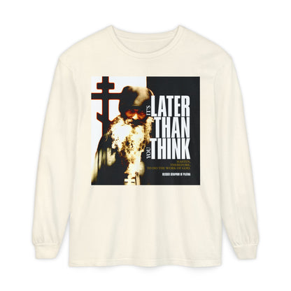 Ivory long sleeve shirt featuring a bearded man and cross graphic with "It's Later Than You Think" in modern poster typography—Orthodox Christian design inspired by Fr Seraphim Rose.