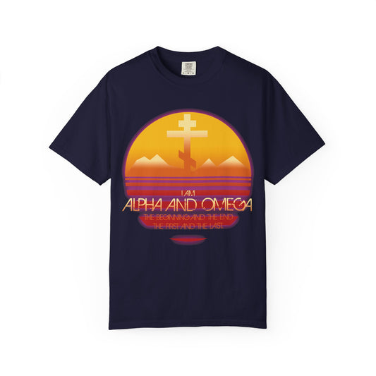 True Navy “Alpha & Omega Beginning & End (Rev 22:13)” heavyweight cotton unisex tee featuring an 80s aesthetic sunset, an Orthodox cross, and the uplifting words: I am Alpha and Omega, The Beginning and the End. Inspired by Revelation 22:13 and incorporating tree of life symbolism, this Christian t-shirt makes a meaningful statement of faith.