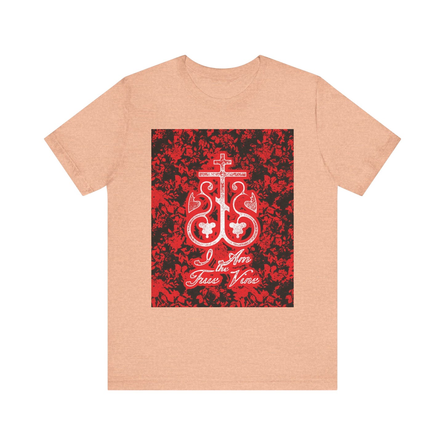 Heather Peach unisex tee with a red and black floral Orthodox cross vine monogram and "I Am the True Vine" text, inspired by John 15:1—reminding you to stay rooted in faith. Lightweight cotton for comfort.