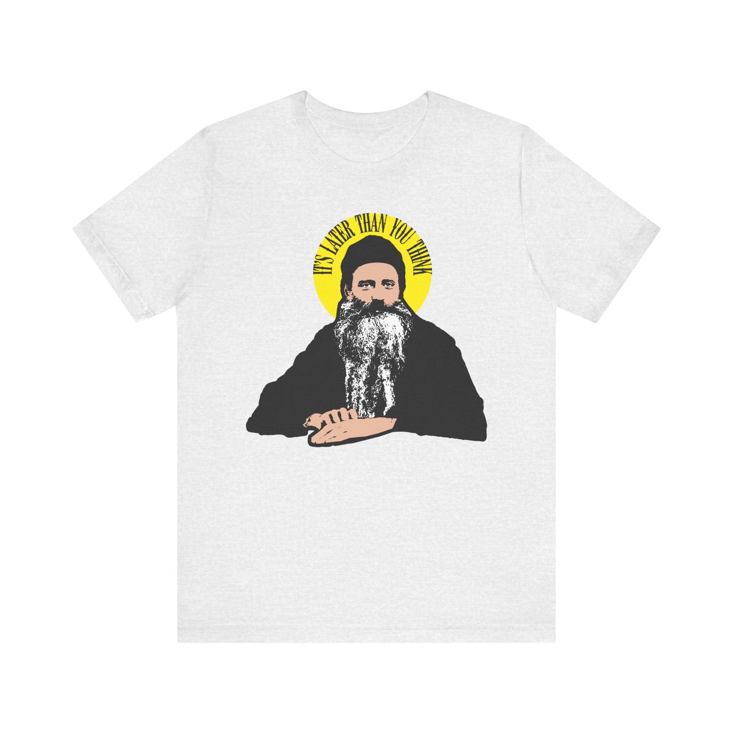Ash-colored unisex tee featuring a St. Seraphim Rose quote—IT’S LATER THAN YOU THINK—inside a yellow halo, with modern Orthodox saint graphic on lightweight cotton.